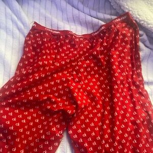 Calvin Klein pajama pants, red with white lettering, size medium